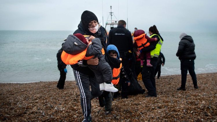 File photo of migrants landing on a beach in south east England after crossing the English Channel (AFP or licensors)